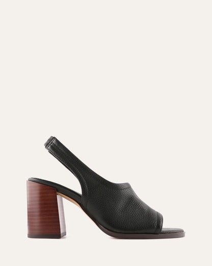 Black open-toe sandal with wooden heel on a white background