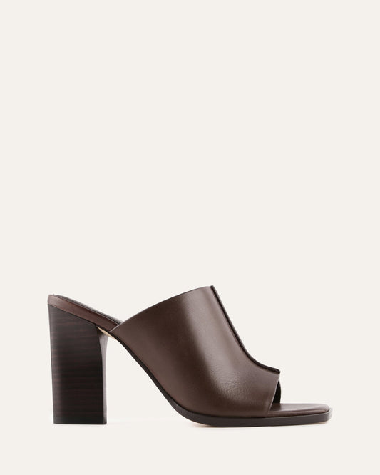 Brown open-toe high-heeled shoe on a light gray background